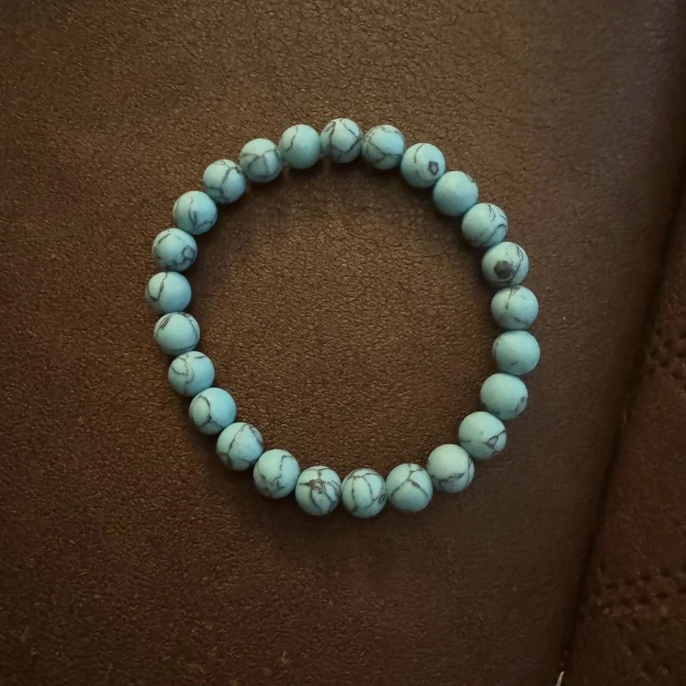 Blue and white beaded bracelet with a touch of boho charm #beadedjewellery
